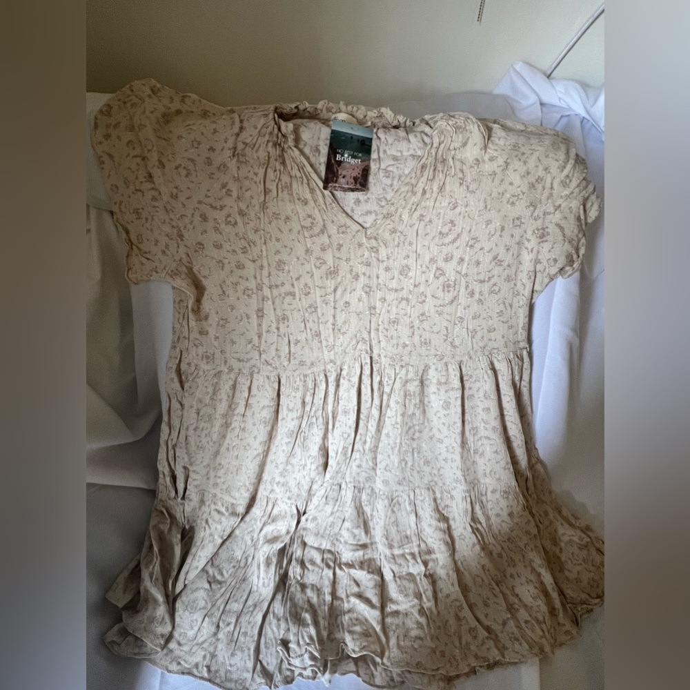 No rest for Bridget flowy mini dress. Size M. Brand new w tags